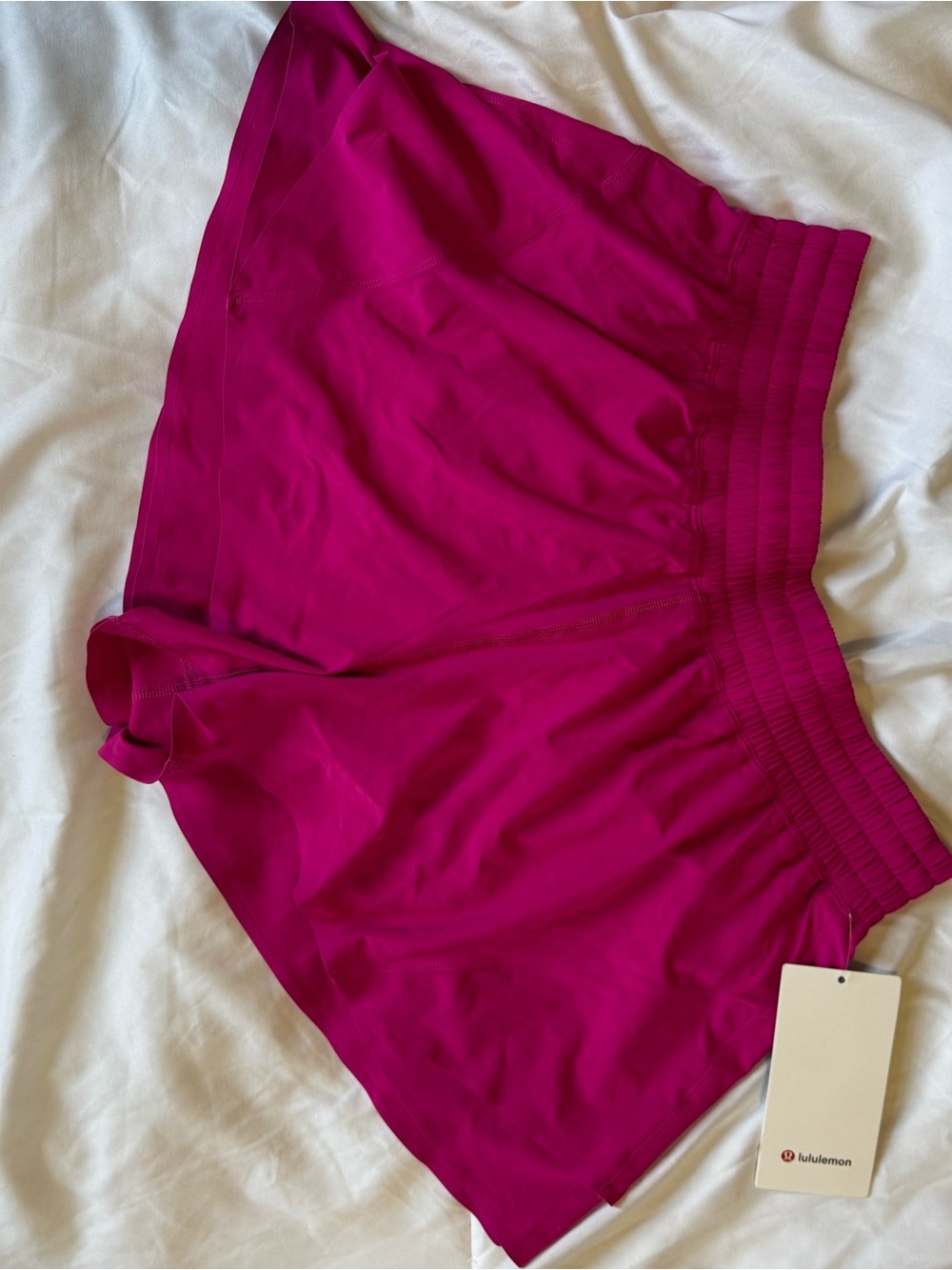 lululemon shake it out high rise shorts in Pink Flare